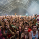 Wellness raves with young people dancing at a daytime alcohol-free event